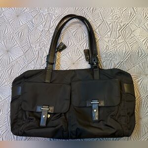 Black Tumi Overnight/Weekender Bag with Dual Front Pockets and Trolley Sleeve